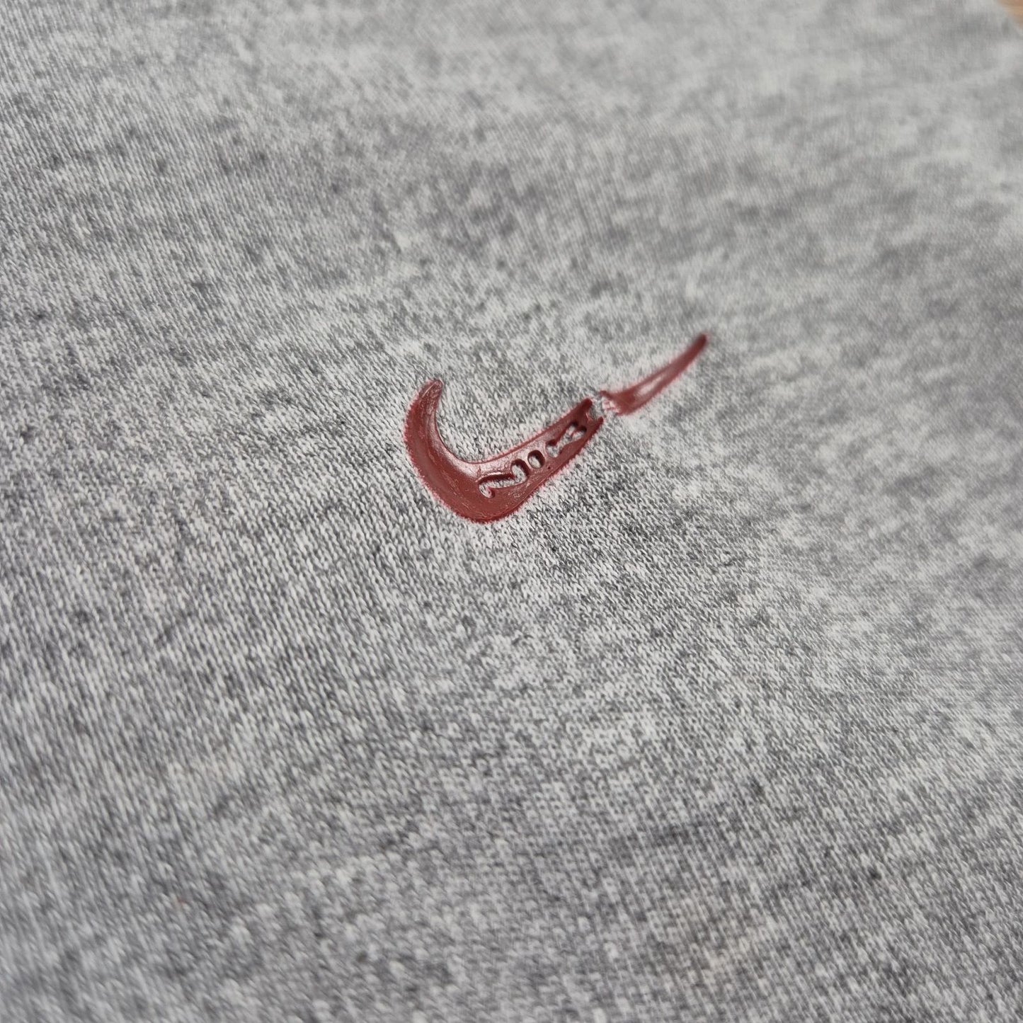 Nike női bő szárú melegítőnadrág – M